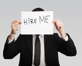 interview techniques, hire me, man with hire me sign